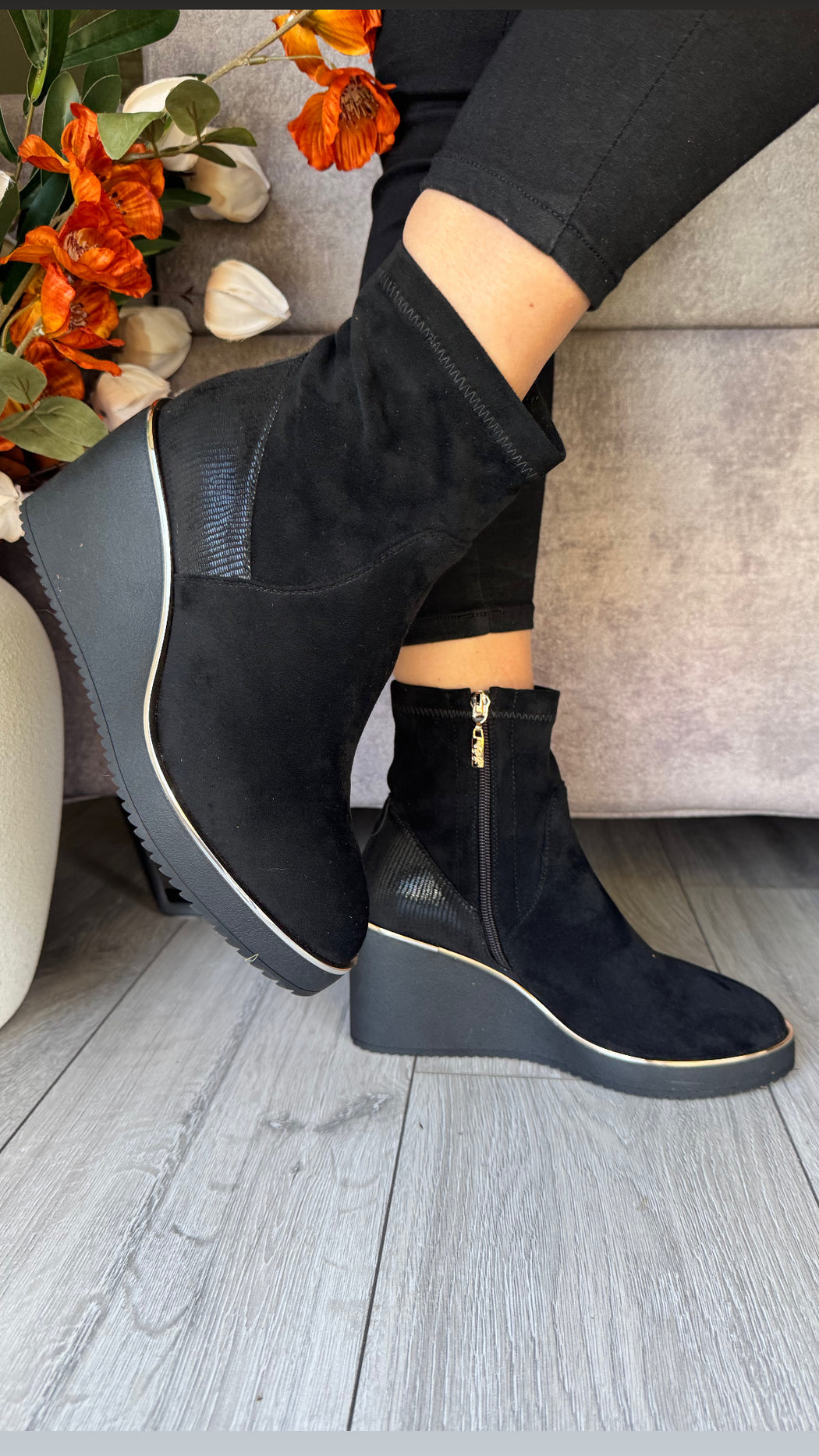 Poole Schwartz black wedge boots