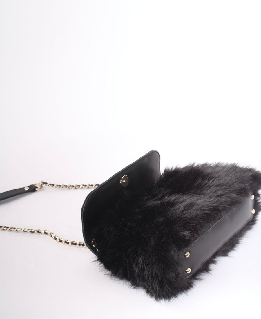 Guess black lise flap over faux fur convertible shoulder / crossbody