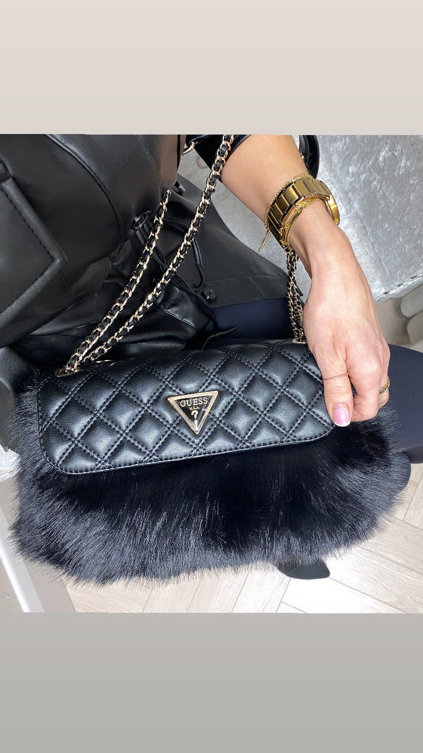 Guess black lise flap over faux fur convertible shoulder / crossbody
