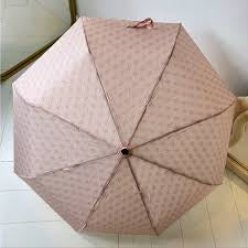 Guess pink 4G logo print umbrella