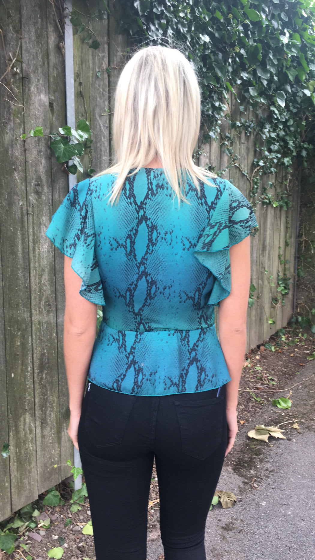 Teal snakeskin frill sleeve top