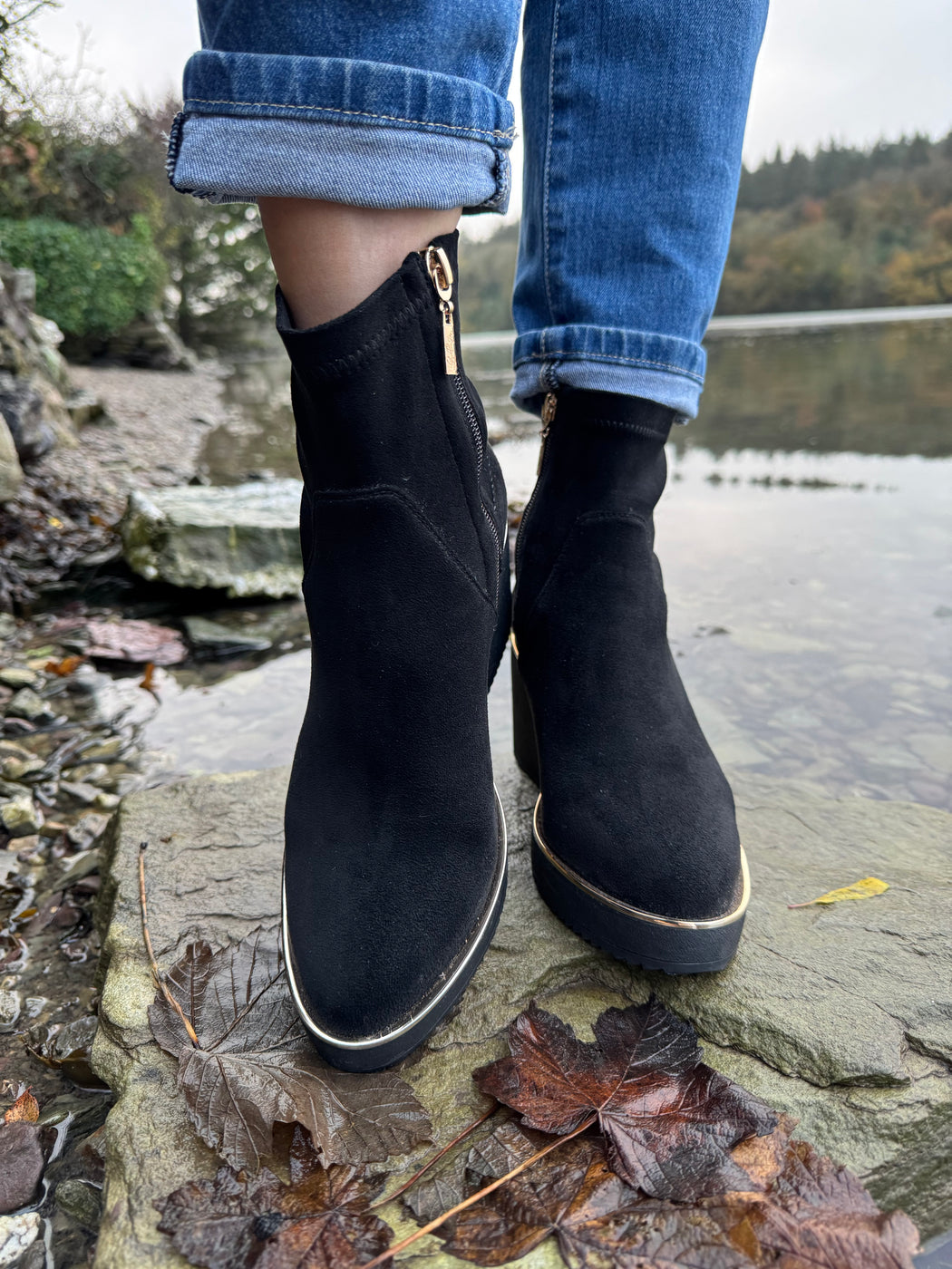 Poole Schwartz black wedge boots