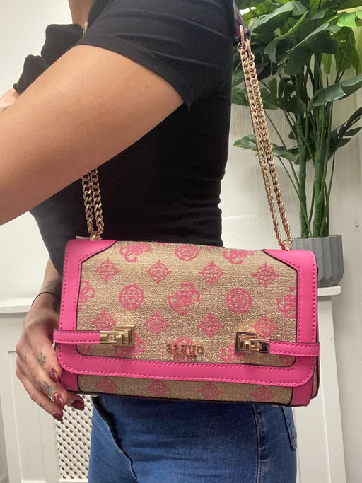 Pink logo guess loralee flap over crossbody / shoulder bag