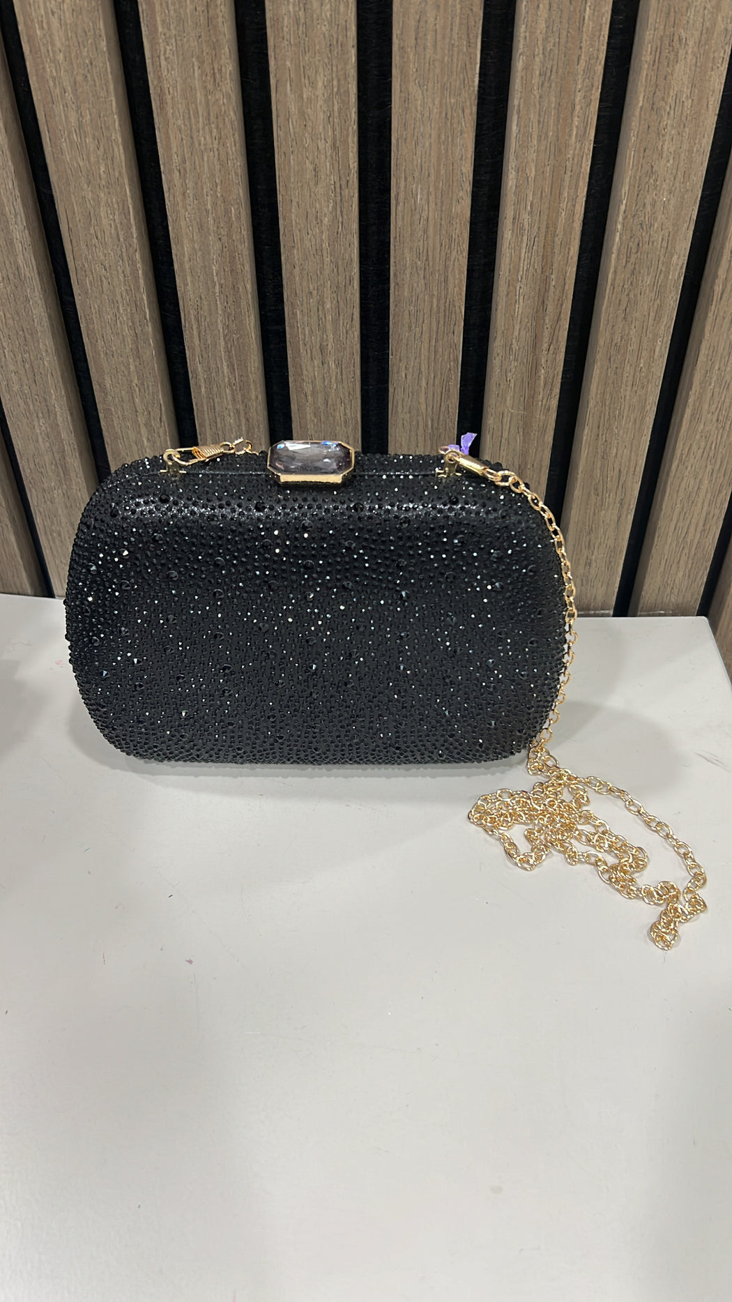 Black sparkle clutch