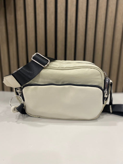 Jill beige crossbody with black strap