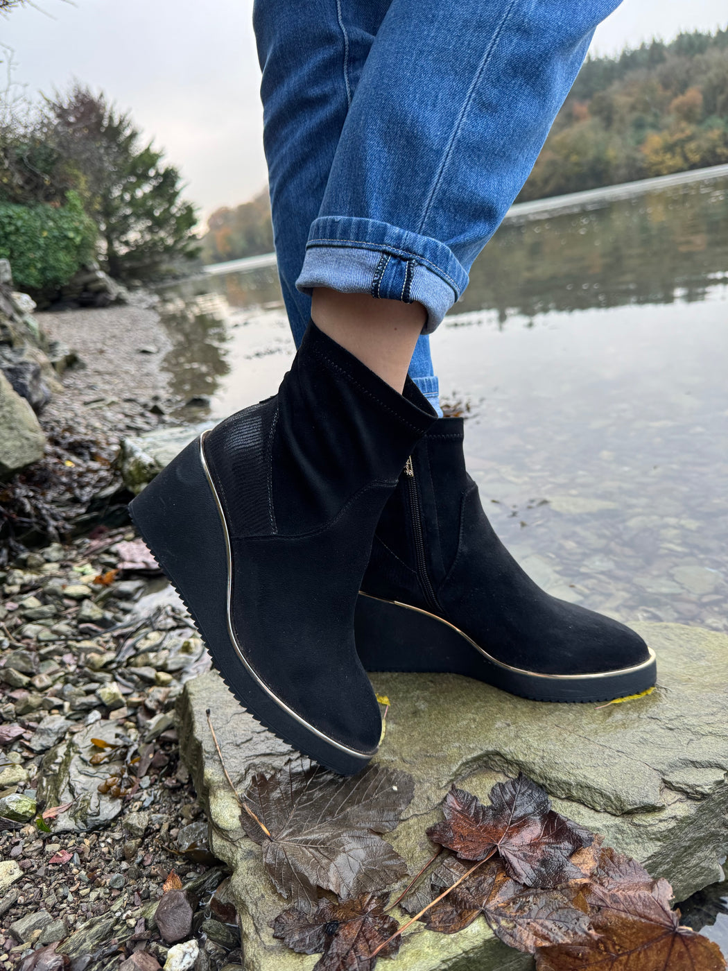 Poole Schwartz black wedge boots