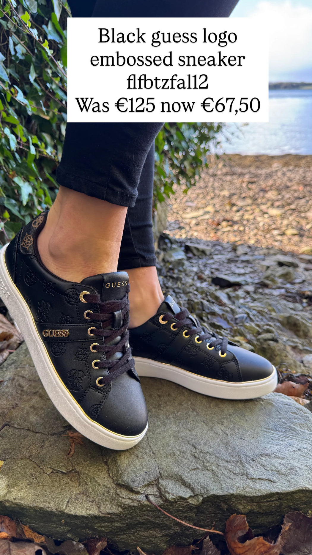 Black guess logo embossed sneaker flfbtzfal12