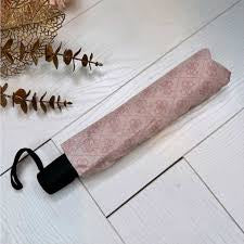 Guess pink 4G logo print umbrella