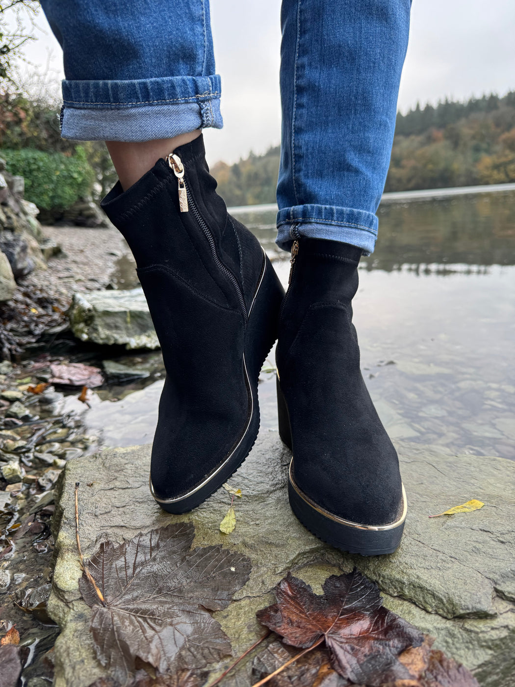 Poole Schwartz black wedge boots