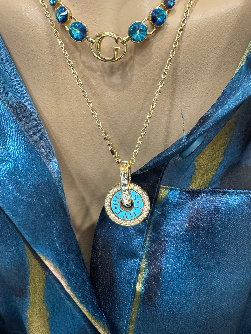 JUBN04077 guess gold blue necklace
