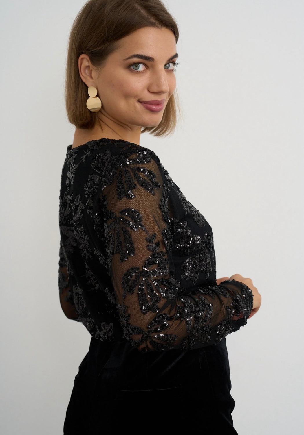 Black signet sequinned top