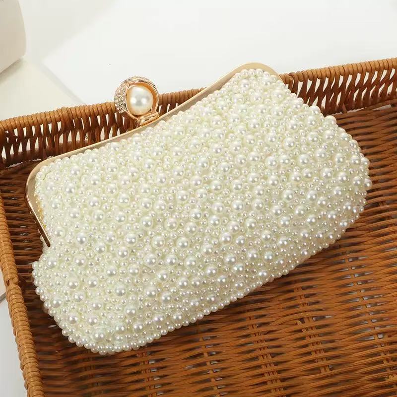 25945 pearl ivory clutch