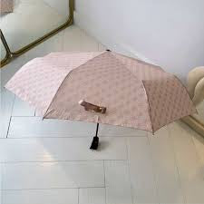 Guess pink 4G logo print umbrella