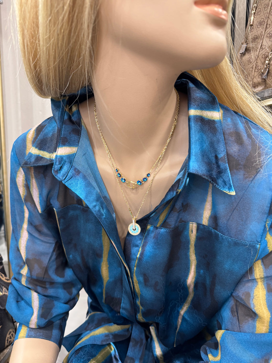 JUBN04077 guess gold blue necklace