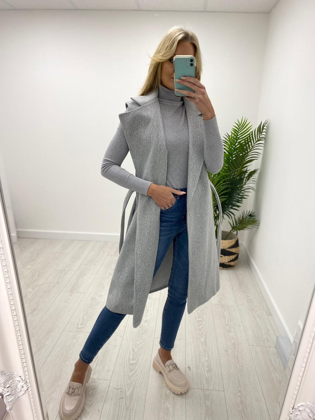 Grey sleeveless jacket